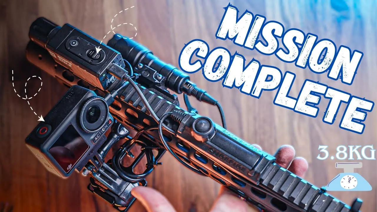 Airsoft rifle with scope camera, action camera and power banks mounted
